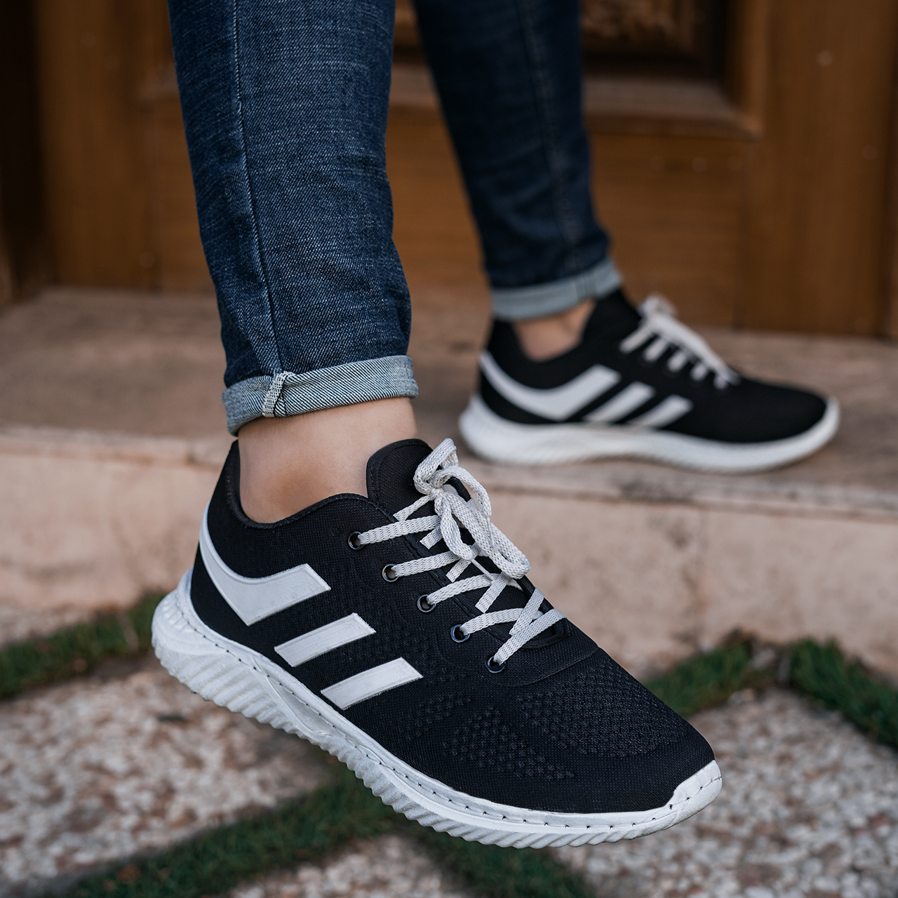 کفش ورزشی آدیداس(T) مشکی زیره سفید مردانه مدل batin