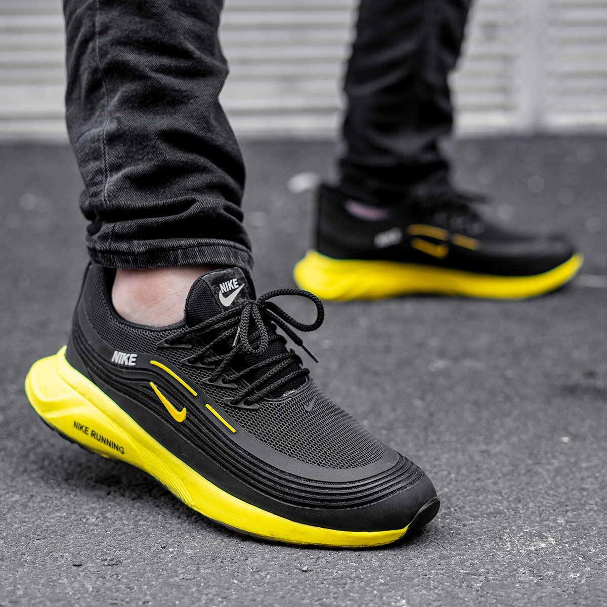 کفش ورزشی Nike مردانه مشکی زرد مدل Viliam
