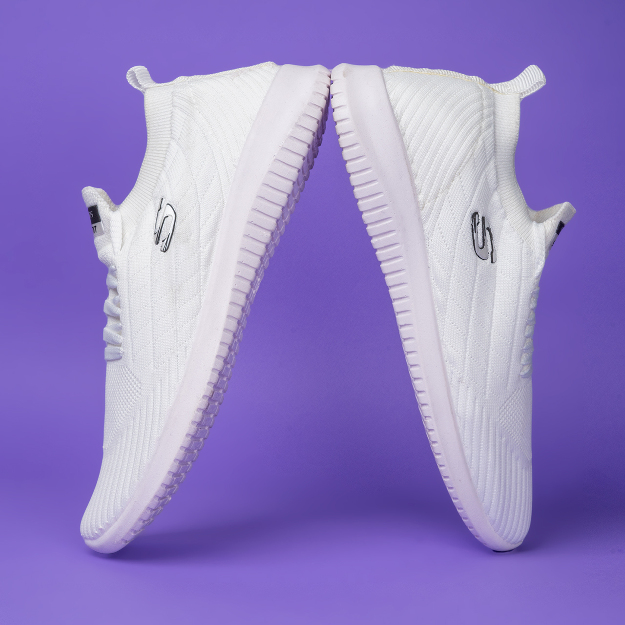 کفش ورزشی اسکیچرز مردانه سفید مدلE55