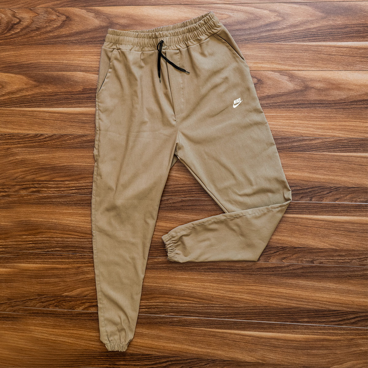 شلوار اسلش Nike کرم مردانه مدلLango