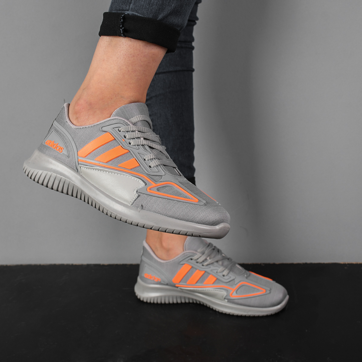 کفش ورزشی Adidas دخترانه طوسی نارنجی مدل Kiana